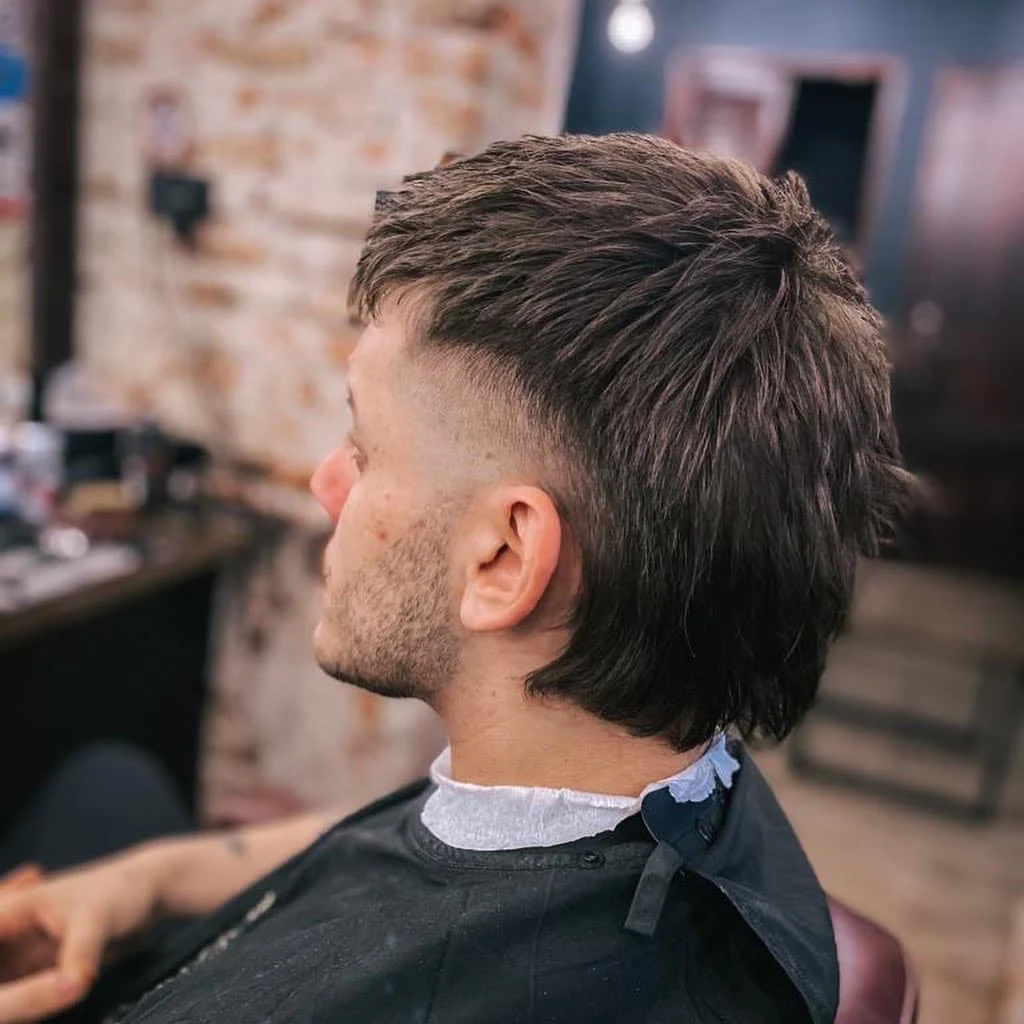 długie włosy u barbera